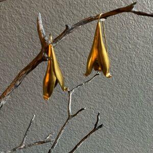 Zara French wire gold tone metal over sized statement flower dangle earrings.